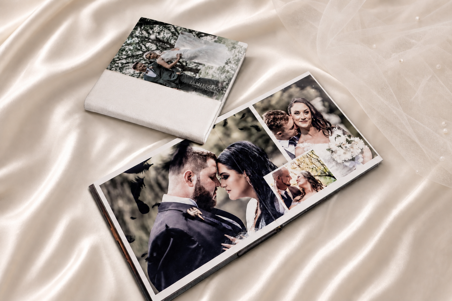 Open Jamie and Co leather-bound wedding album on ivory satin
