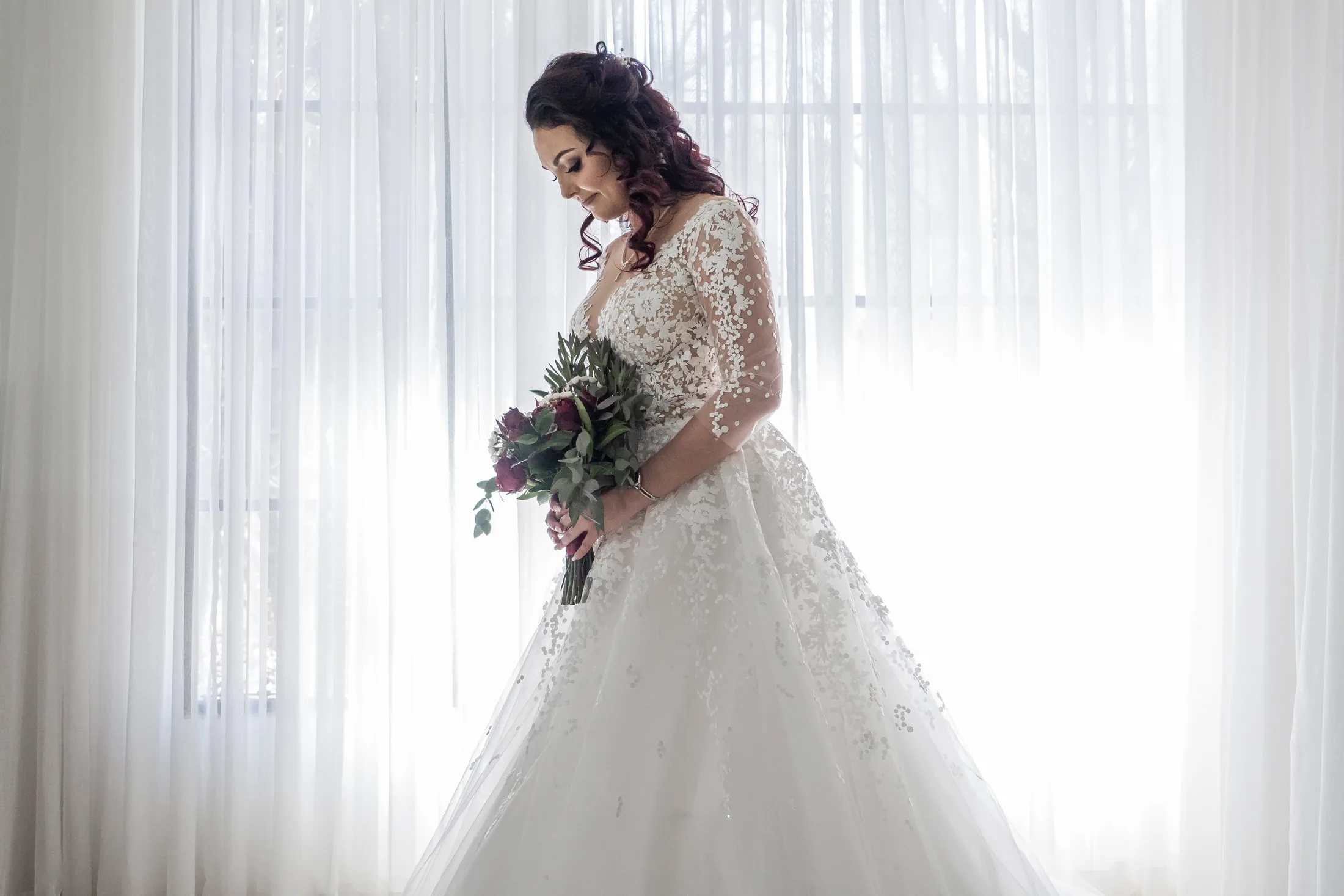 Portrait of Melanie in her wedding dress