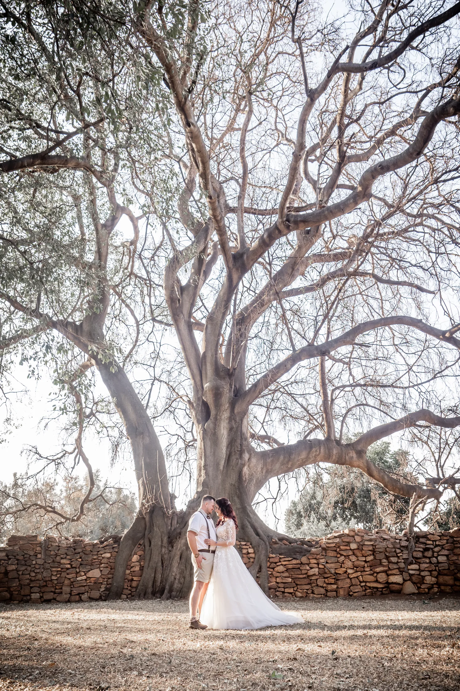 Melanie standing beneath a large tree at Cussonia Crest