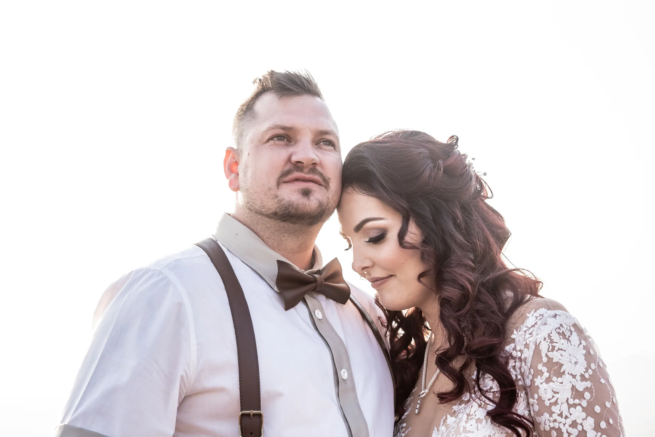 Armand and Melanie embracing during their couple shoot
