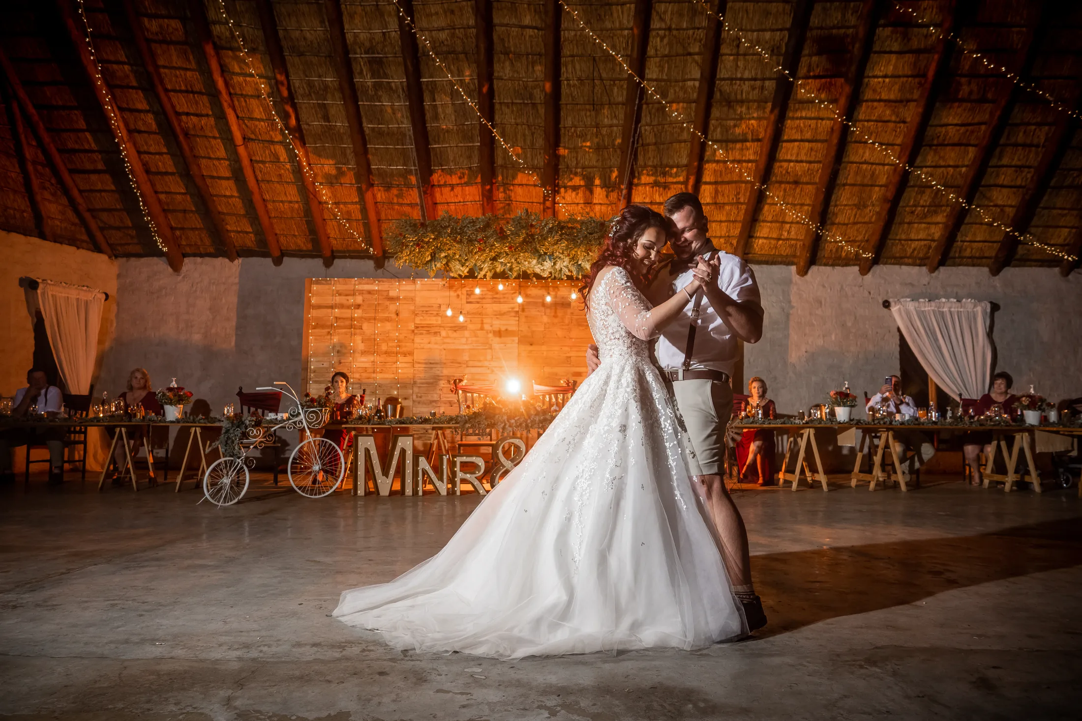 Armand and Melanie sharing their first dance