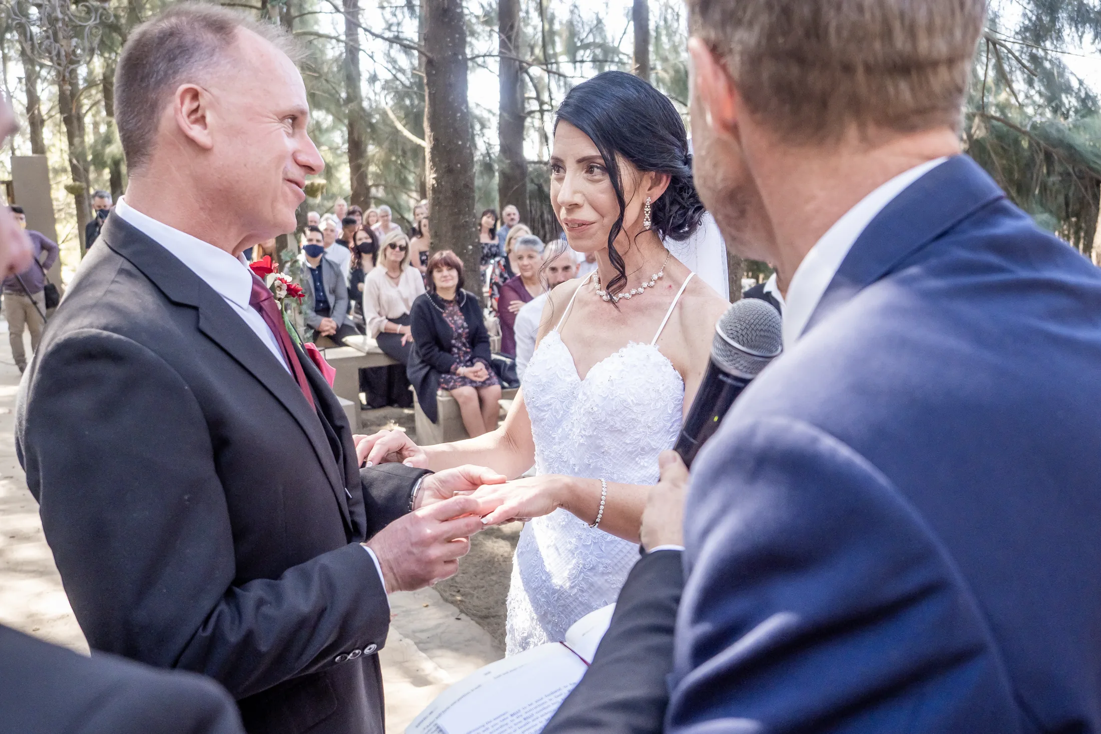 Billy and Karen exchanging rings at the ceremony