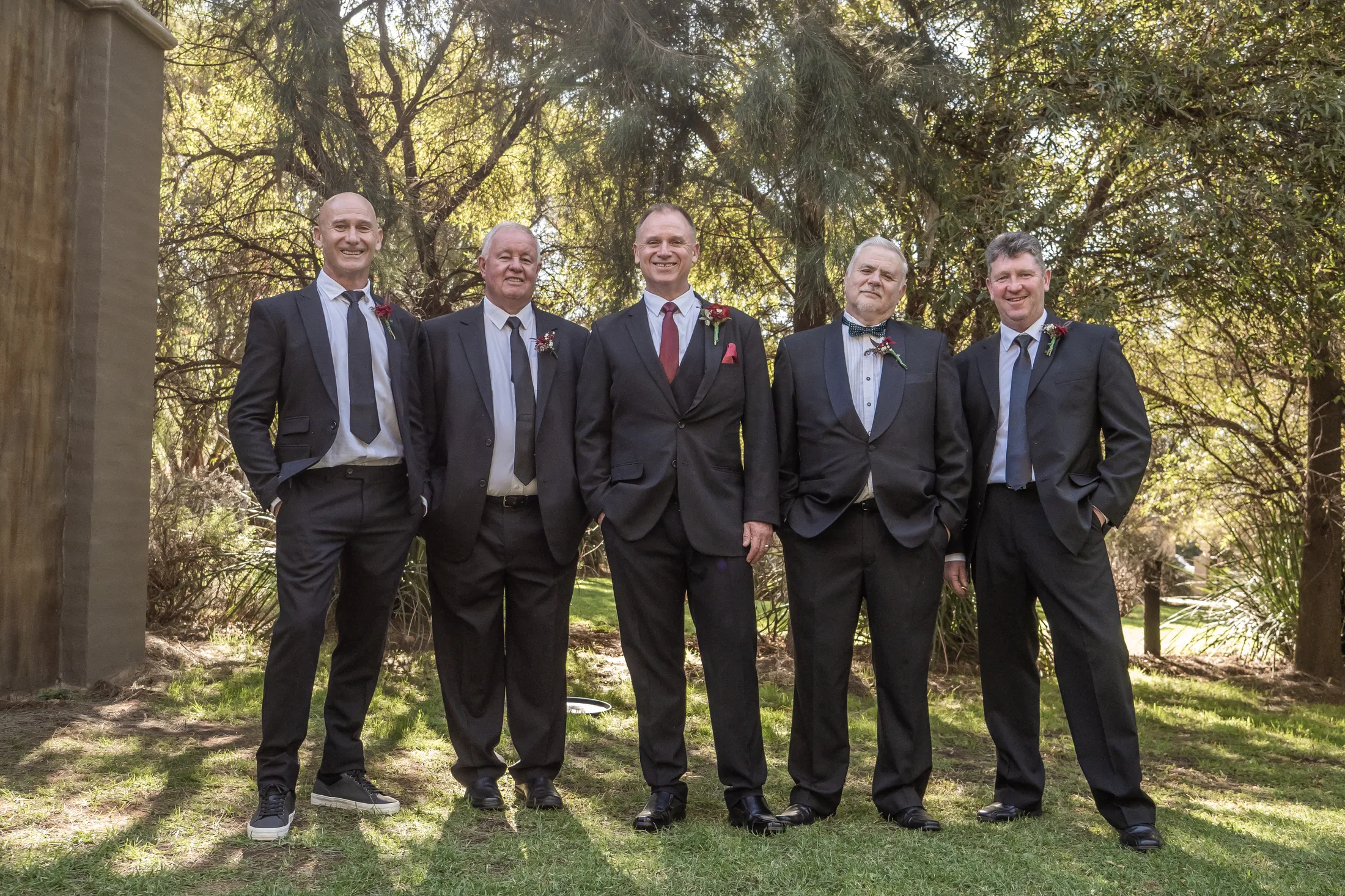 Billy with his groomsmen in the gardens