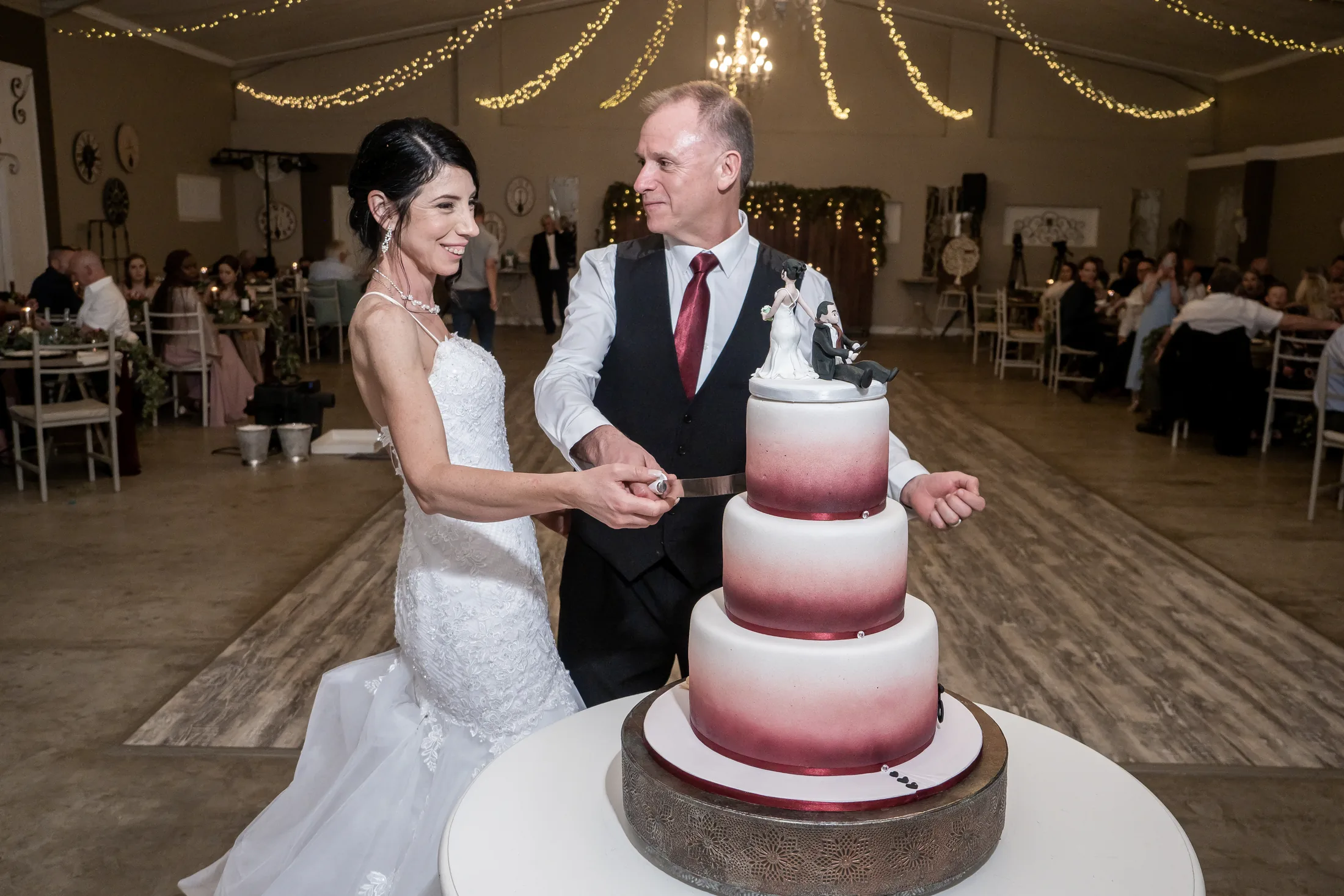 Billy and Karen cutting their wedding cake