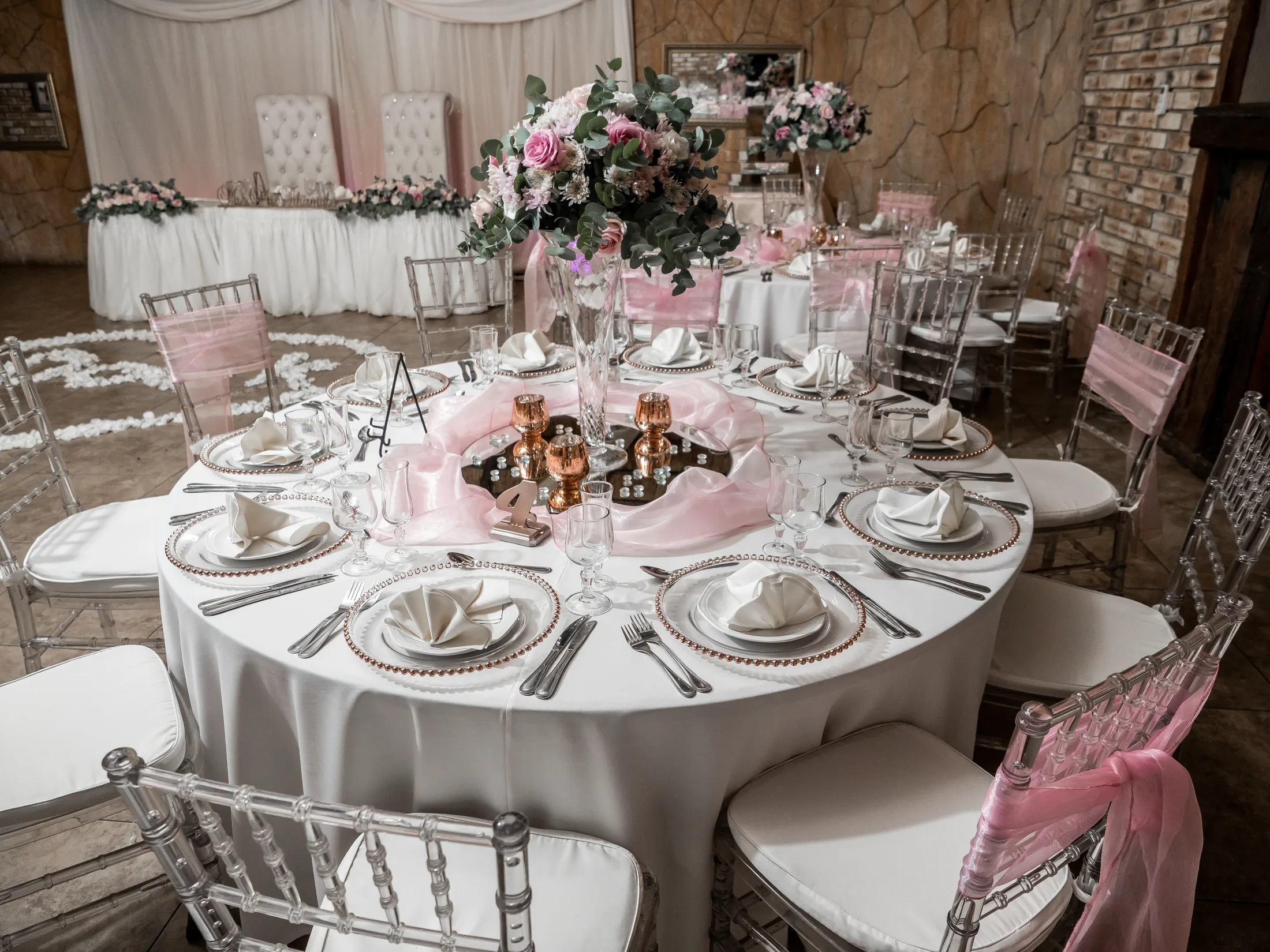 Pink wedding flowers and reception details at Makiti
