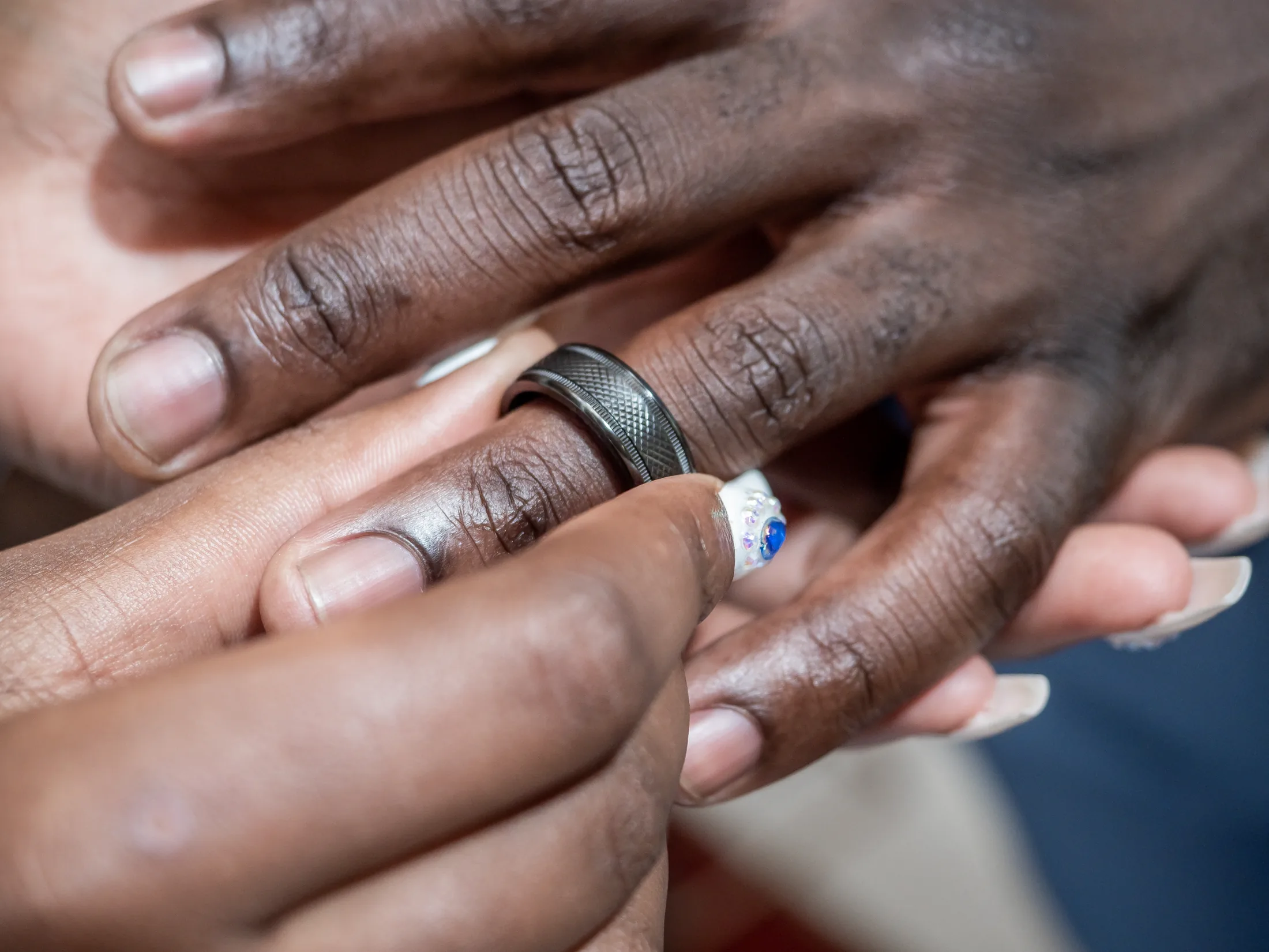 Dumi and Karabo showing their wedding rings
