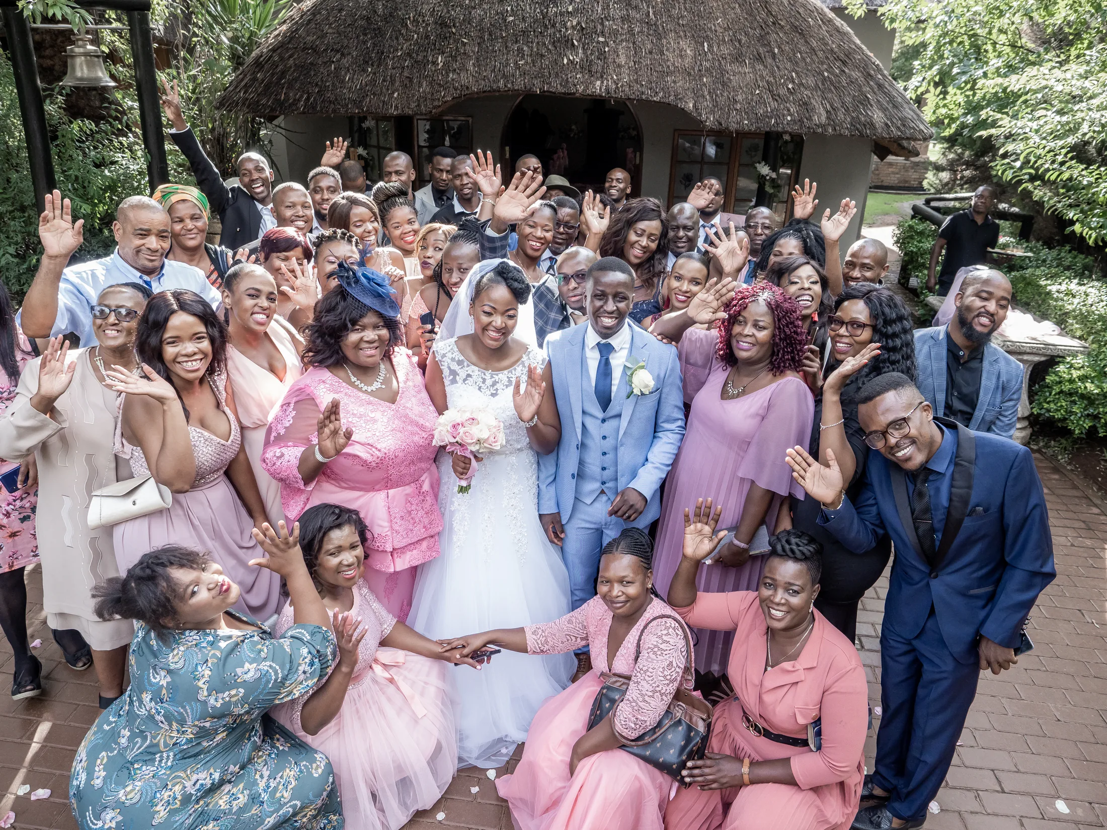 Dumi and Karabo celebrating with family and friends