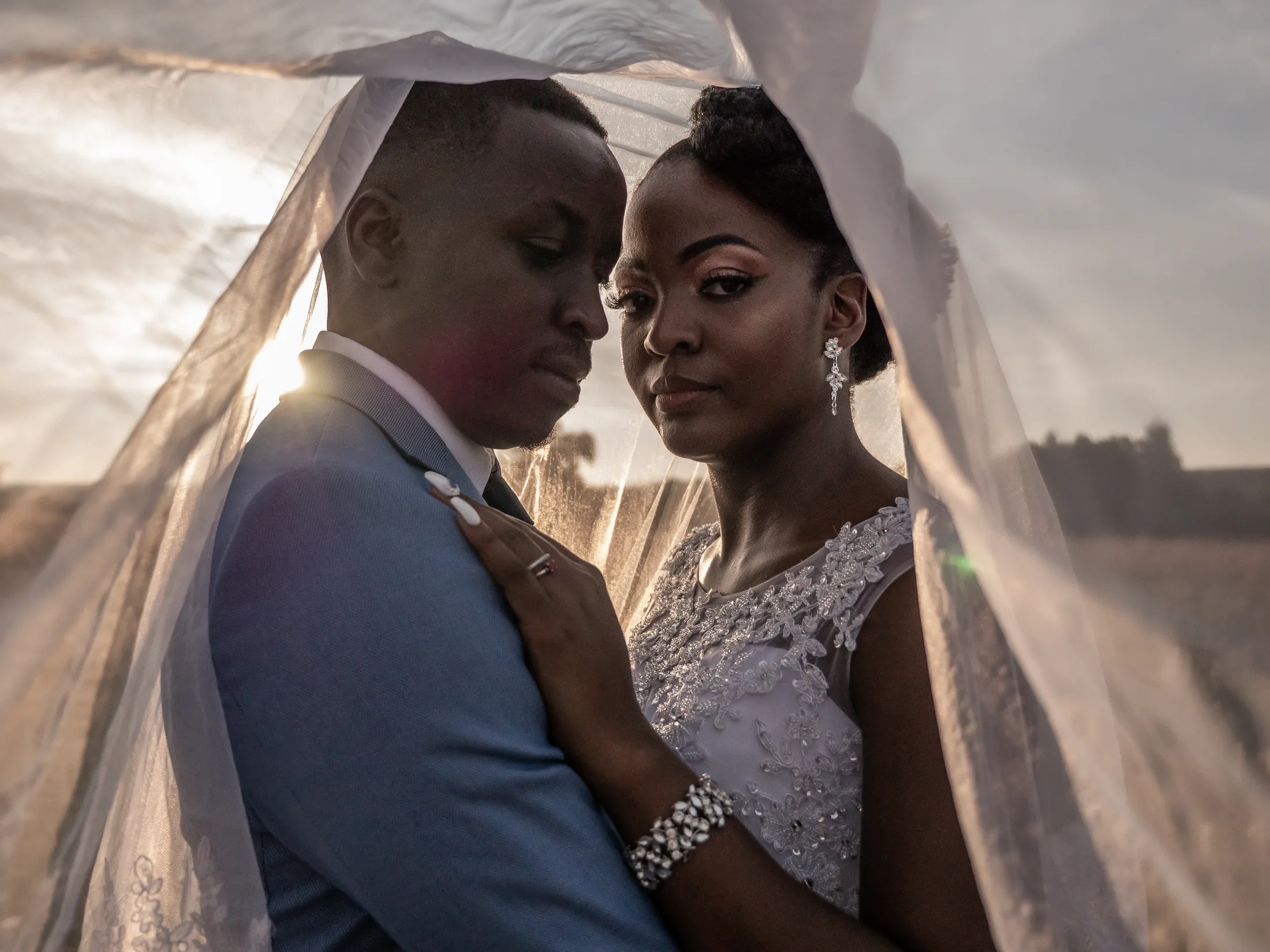 Dumi and Karabo beneath Karabo’s veil