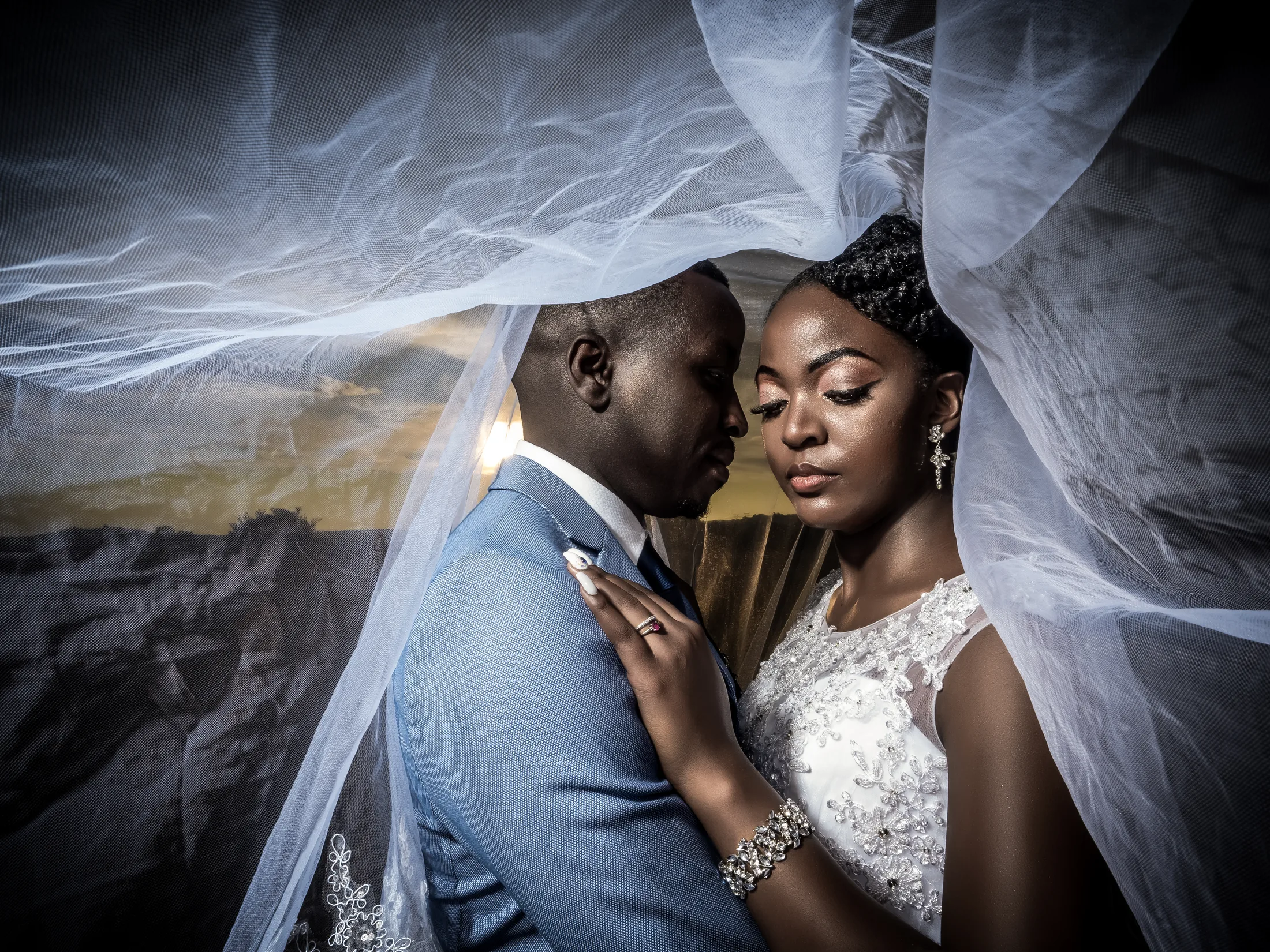 Dumi and Karabo together beneath the veil after dark