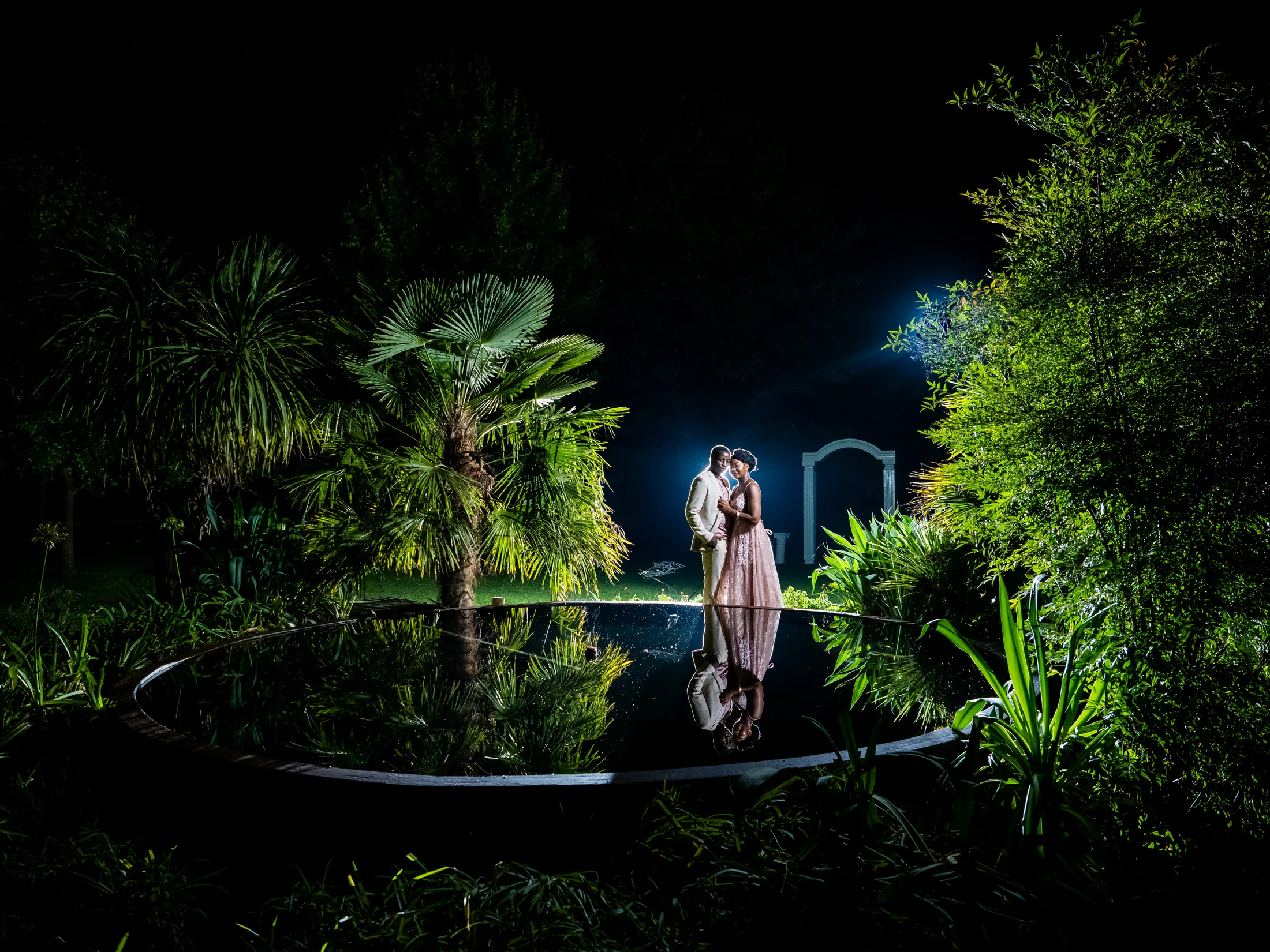 Dumi and Karabo in a dramatic night portrait outside Makiti