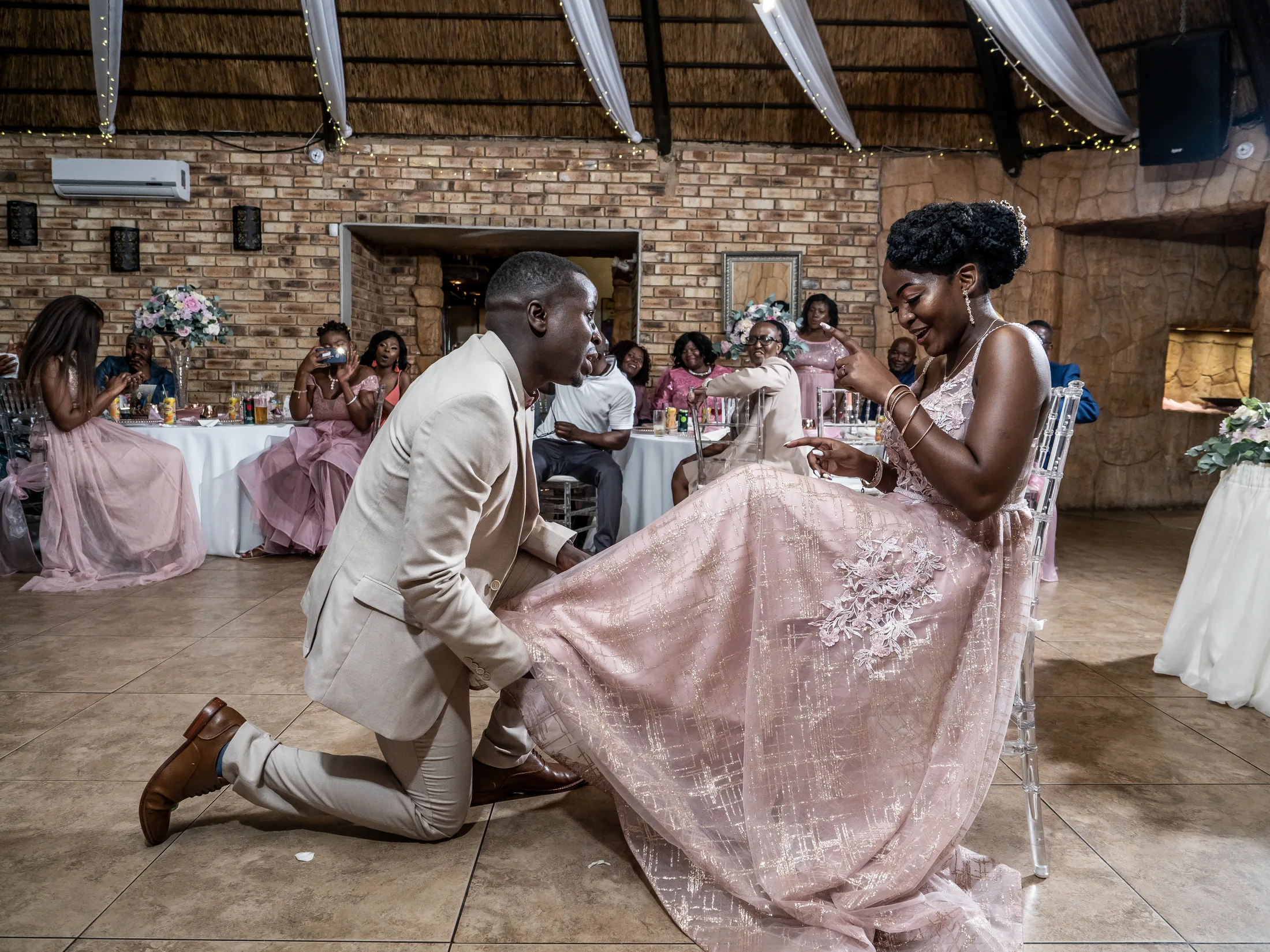 Dumi celebrating with a loved one on the dance floor