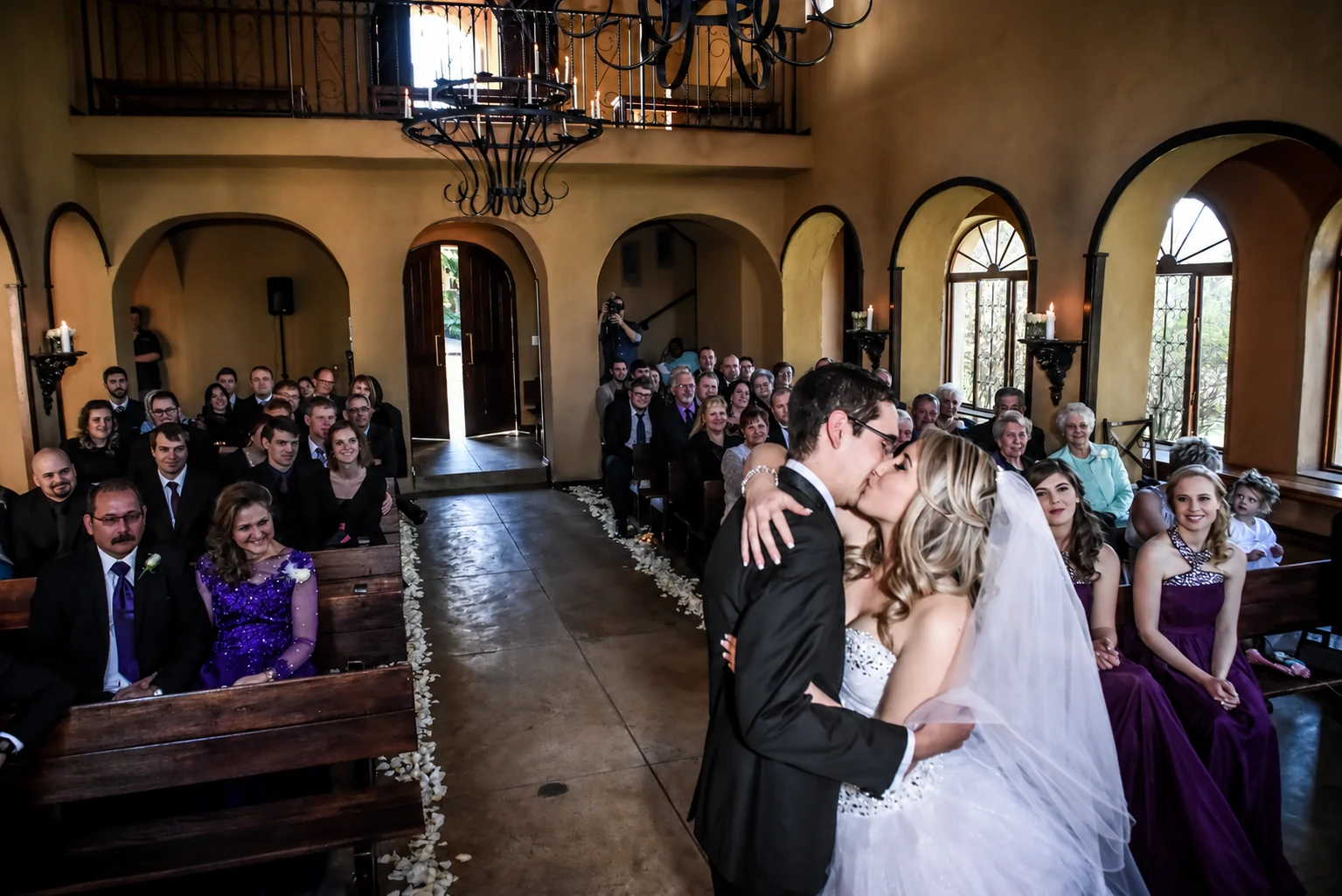 Ettienne and Dorme kissing in the chapel