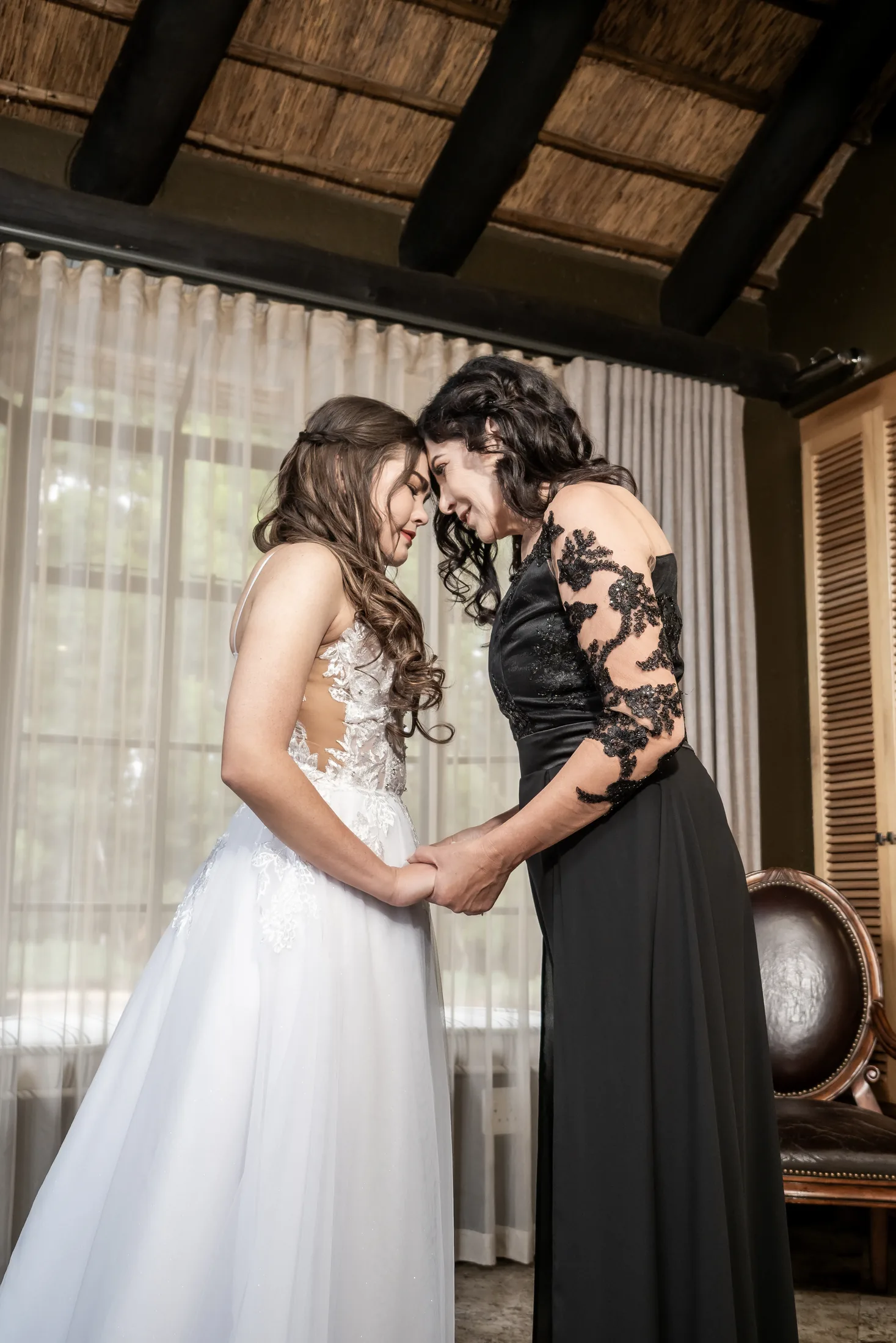 Anastasia embracing a loved one before the ceremony