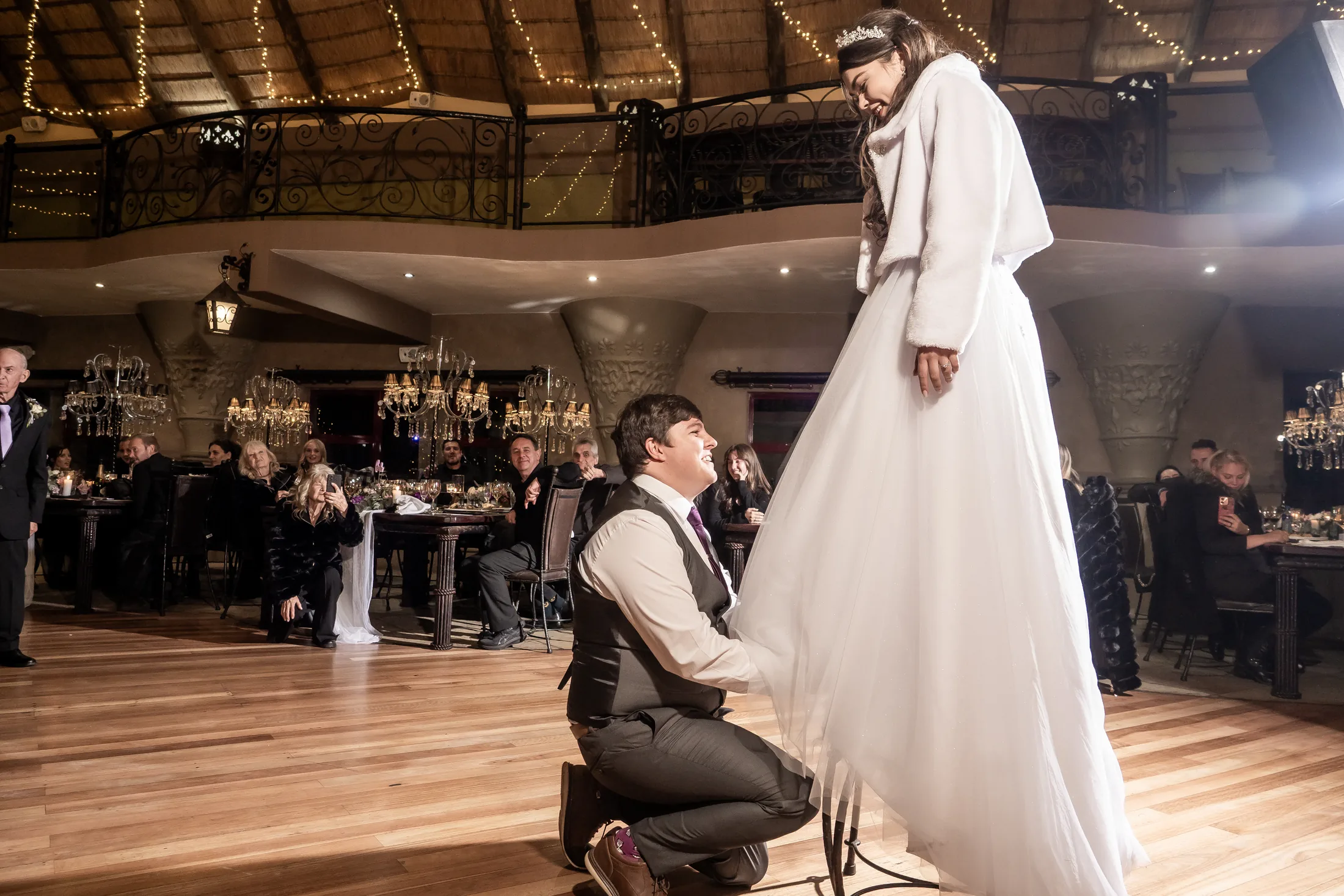 Franco and Anastasia enjoying a playful moment on the dance floor