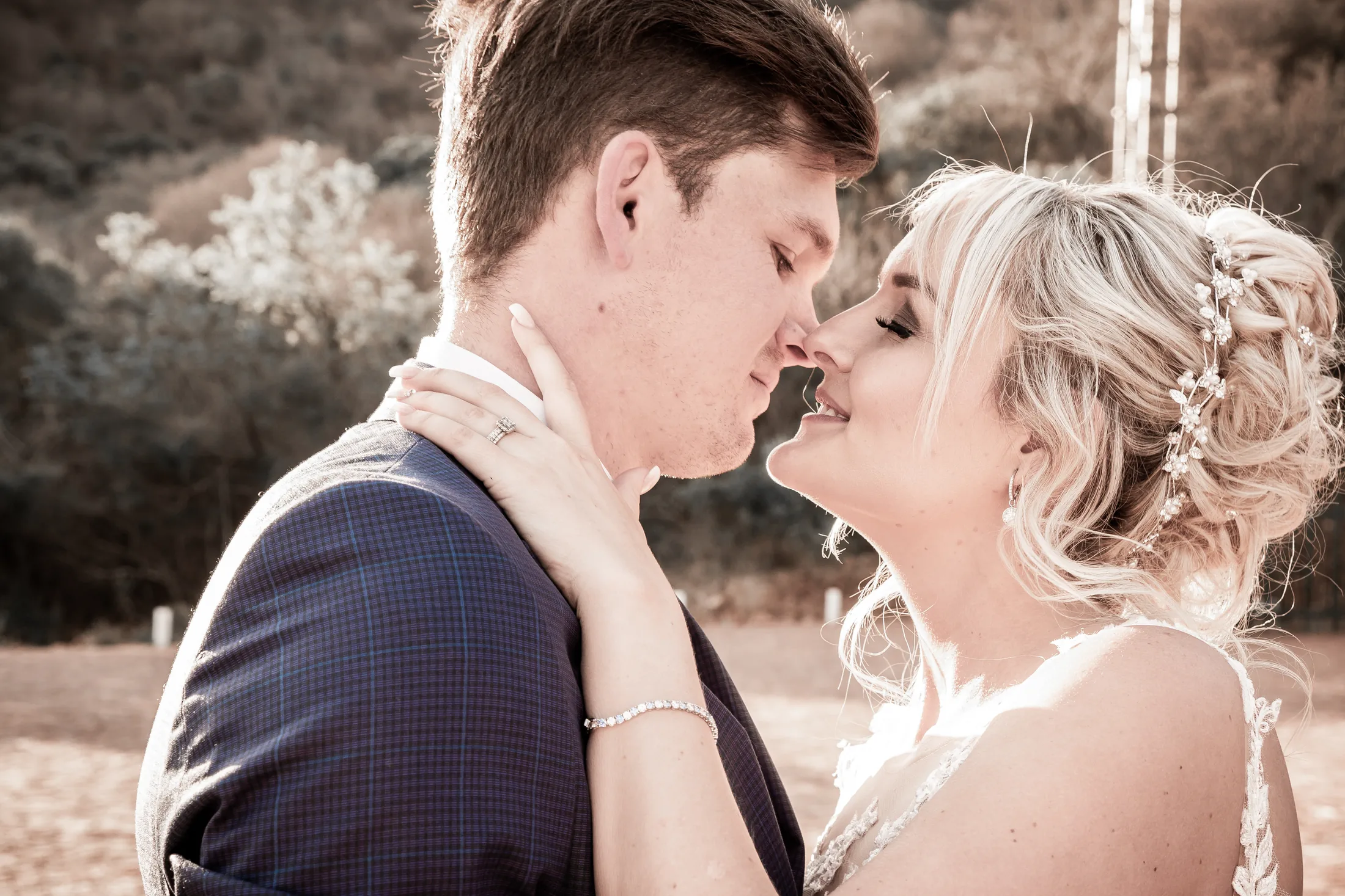 Xander and Leani sharing a quiet portrait outdoors